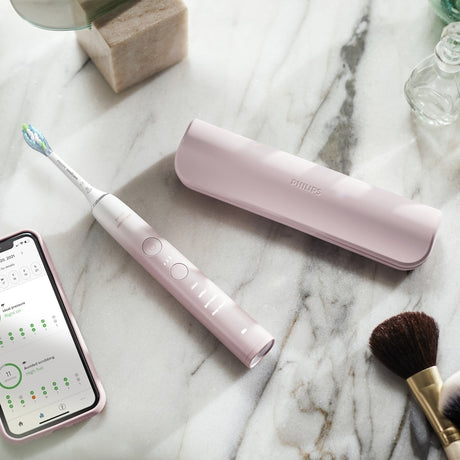 Periuta electrica sonica PHILIPS Sonicare DiamondClean Seria 9000 HX9911/79, 1 toc de transport, 4 capete C3, suport de incarcare, roz